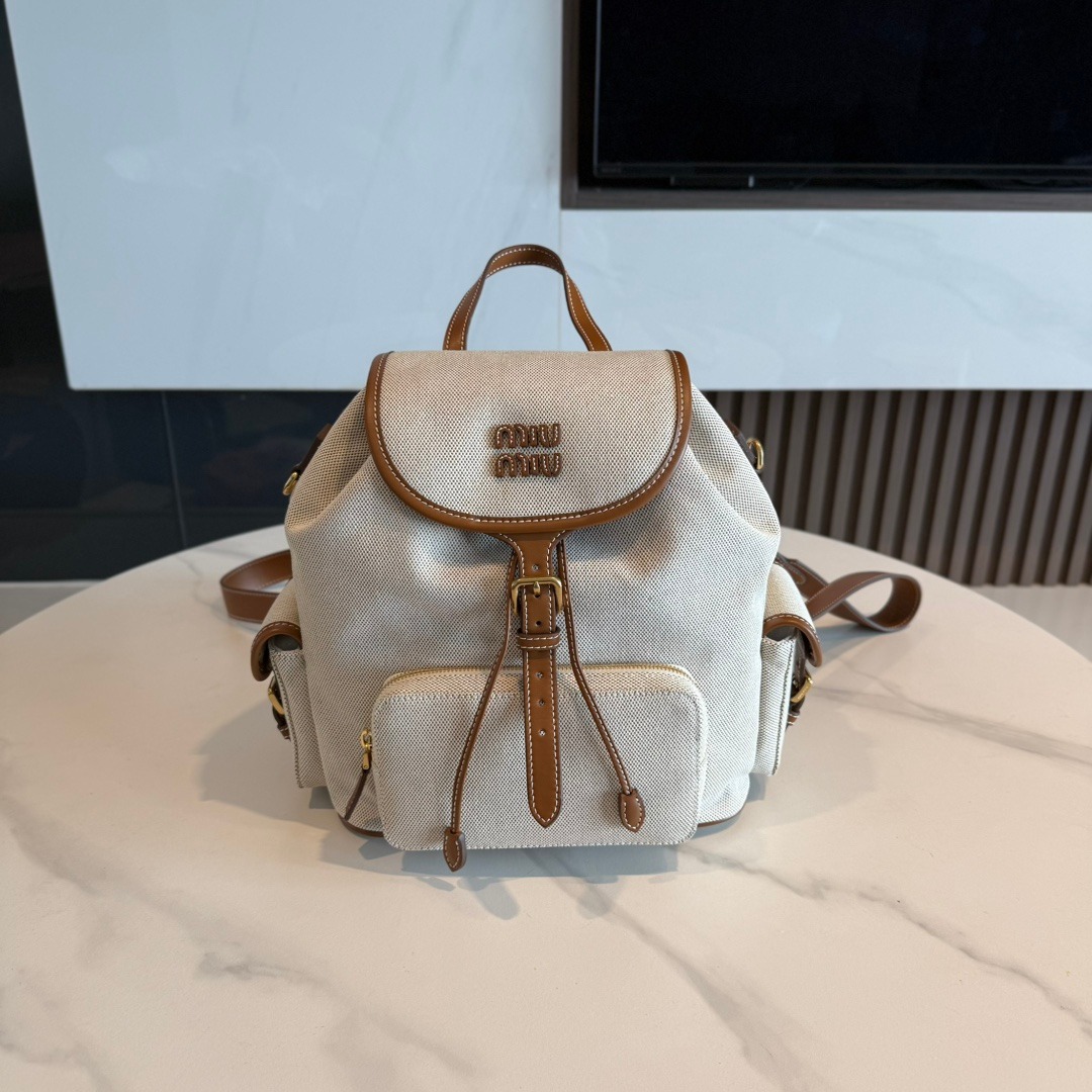 Miu Style 25SS Patchwork Leather Backpack Canvas Cowhide Contrast Design