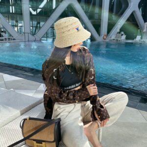 Elegant Solid Color Hollow-Out Fisherman Hat for Women – 2026 Spring/Summer Travel Sun Protection Face-Shaping Bucket Hat