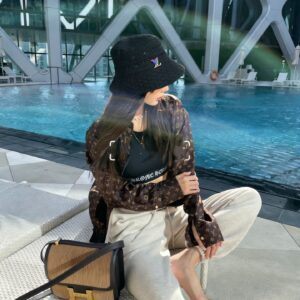 Luxury Solid Color Hollow-Out Fisherman Hat for Women – 2026 Spring/Summer Travel Sun Protection Face-Shaping Bucket Hat